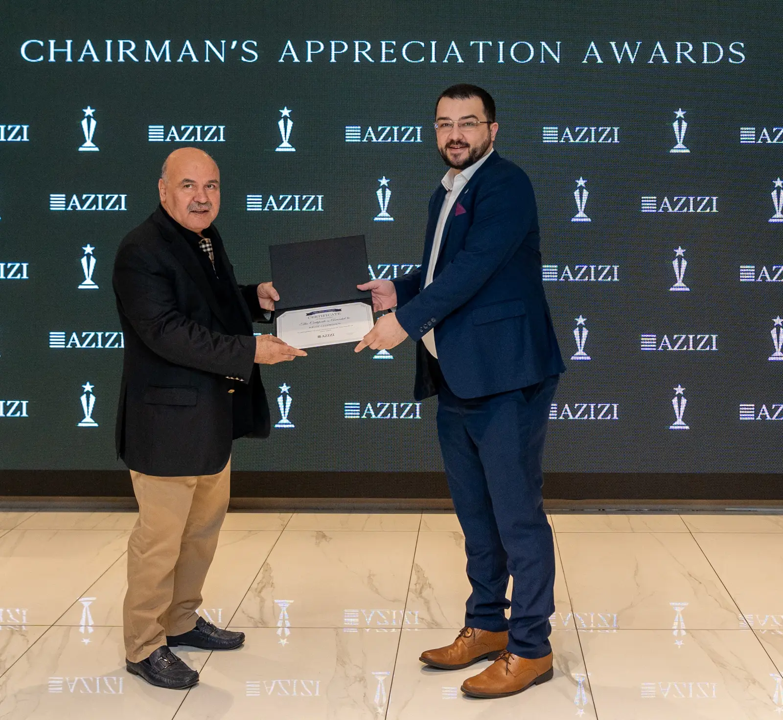 Krste Gelebeshov receiving a Chairman's Appreciation Award